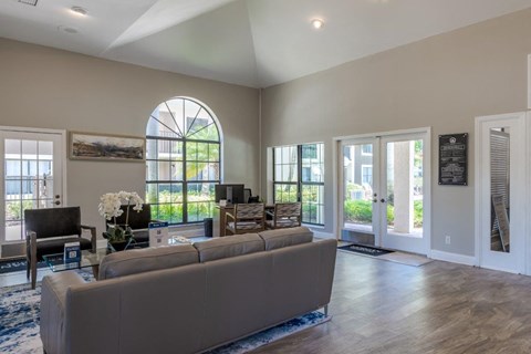 a living room with a couch and a table